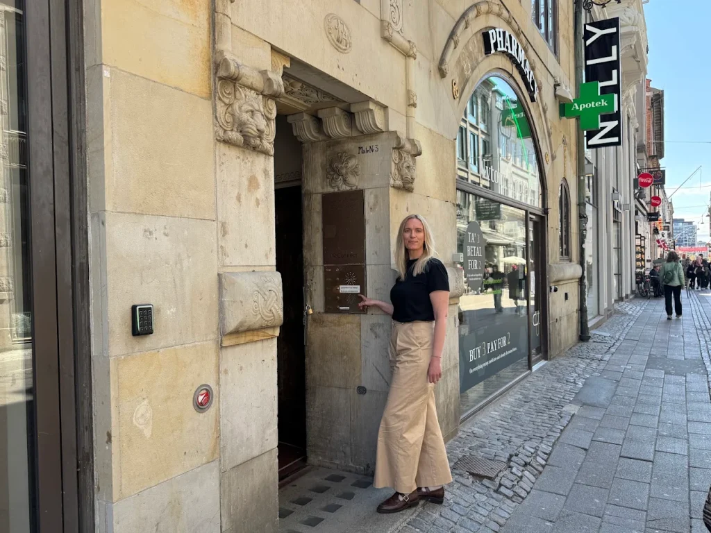 The entrance to Frederiksberggade 1A on Strøget — YourGP is on the 3rd floor